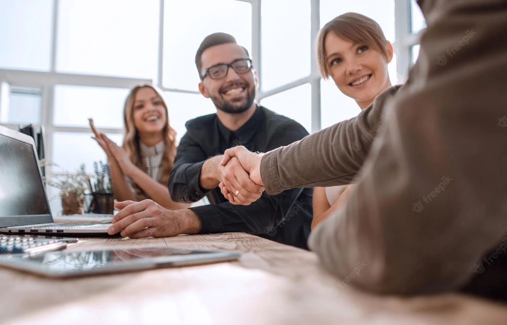 Recruiter and candidate shaking hands